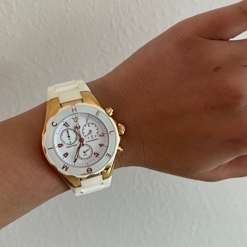 Women’s Michele white and rose gold watch. Battery not included.